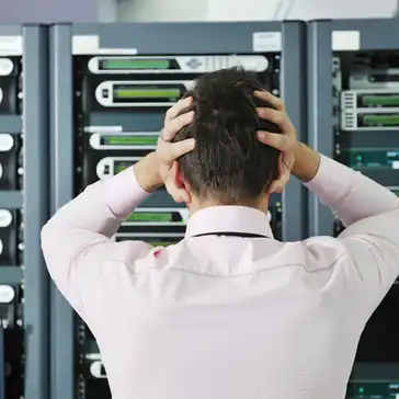 Business owner reviewing recurring IT support problems